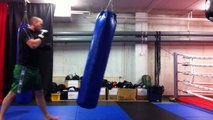 Kickboxing, heavy bag training, low tempo