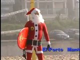 Surfing Santa Claus gets some great Christmas waves in Hermosa Beach, California!