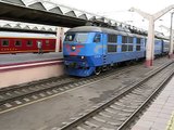 Electric locomotive CHS6 pulling the Express train arrives at Leningradsky Railway Terminal, Moscow.