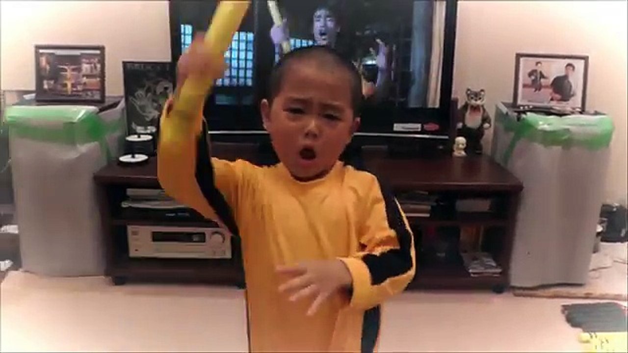 5year old) acting Bruce Lee's nunchaku scene