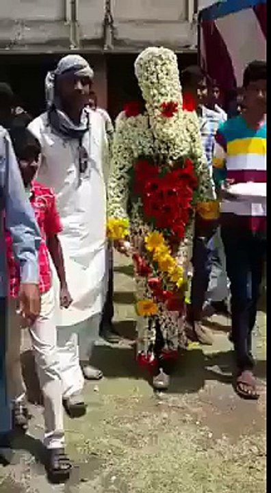 Check This Groom Covered With Flowers