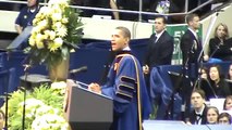 Protester while Obama giving commencement speech at Notre Dame