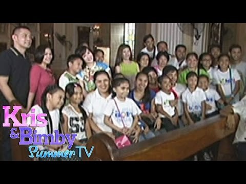 Kris explains to Bimby why people love taking pictures with them