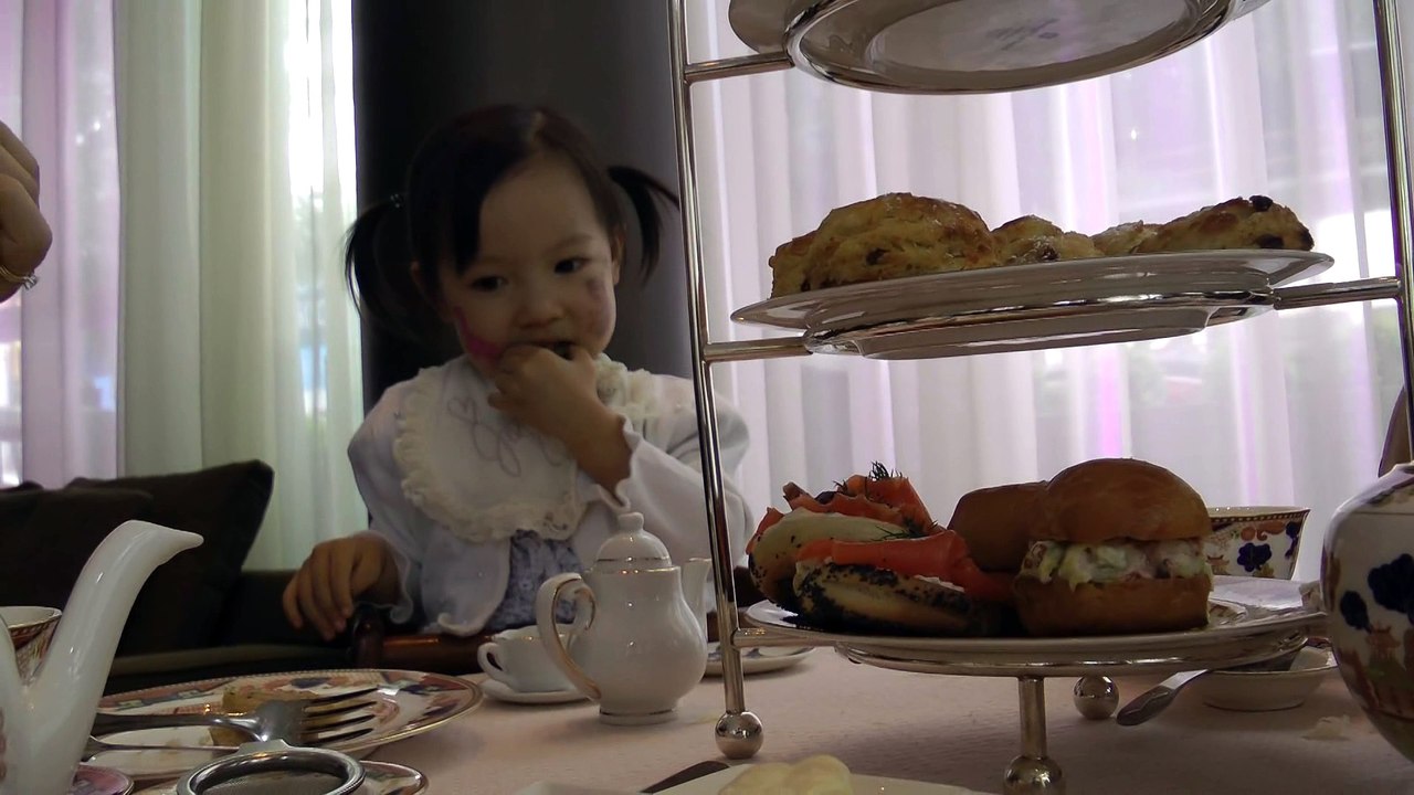 Girl Having Afternoon Tea