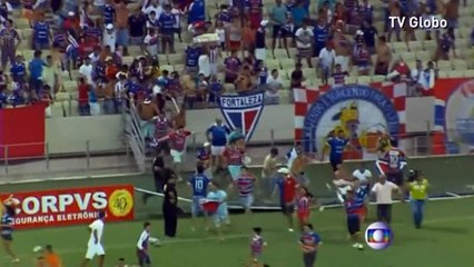 Football fans storm the pitch in Northeastern Brazil