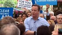 Cameron answers heckler during speech