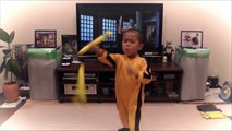 5 year old shadowing Bruce Lee's nunchaku scene in 