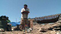 Residents of remote quake-hit village in Nepal salvage remains