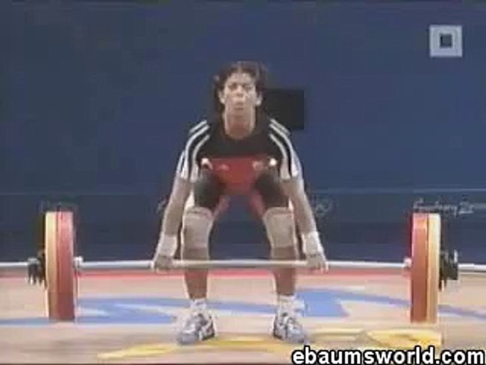 girl peeing while lifting weights