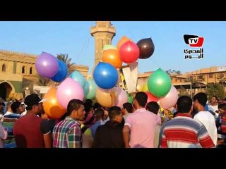الإخوان تحتفل ببالونات مرسي أول أيام العيد