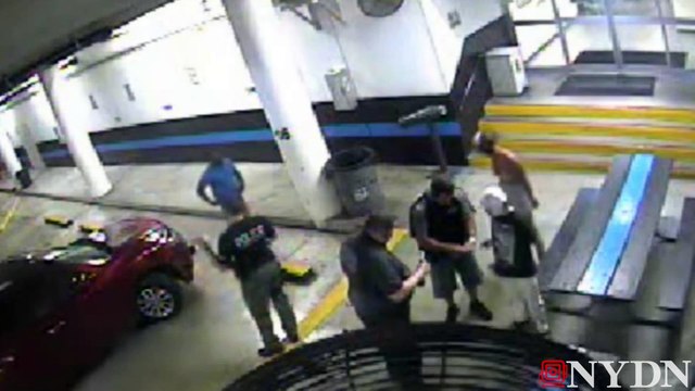 Raw: Miami Beach Police Detective Punches Handcuffed Woman