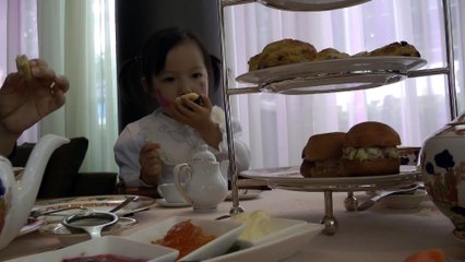 Girl Having Afternoon Tea