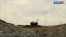Four drunked man driving a tank
