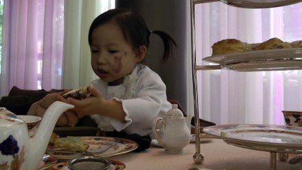 Girl Having Afternoon Tea
