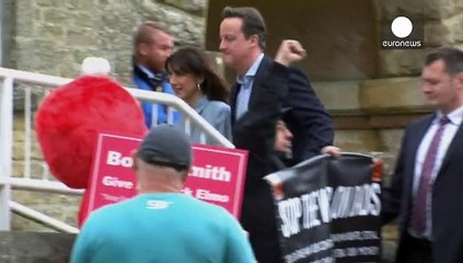 Candidates go to vote in closest British election in a generation