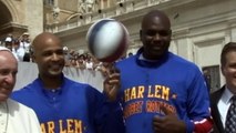 Pope tries his hand at basketball with Harlem Globetrotters