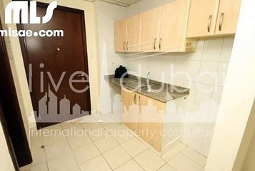 Ready Studio with Balcony in International City  Spain Cluster - mlsae.com
