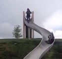 Little Boy Rushes Down Super Slippery Slide