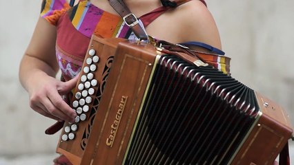 Patrícia Pereira playing Concertina in Lisbon  ( diatonic accordion )