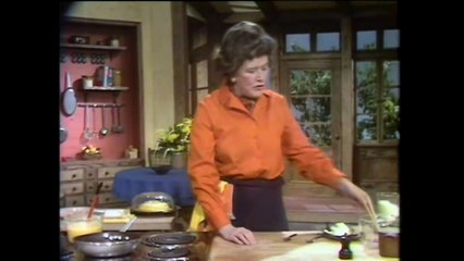Julia Child makes an omelet