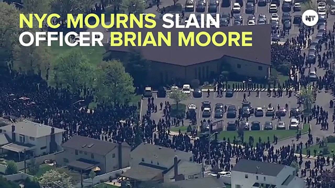 Tens Of Thousands Of People Gathered For NYPD Funeral