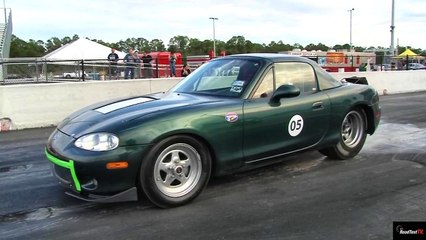 TESLA P85 Gets ZAPPED by Electric MIATA !!  - 1/4 mile Drag Race Video - Road Test TV