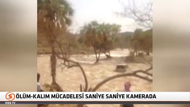 Sele kapılan araçta ölüm-kalım savaşı kamerada!