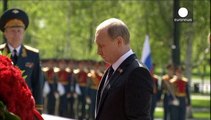 Putin and Merkel agree Ukraine peace deal not being respected