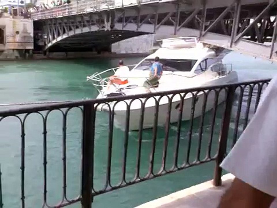 Drunken idiots crash their boat under bridge!  Funny!
