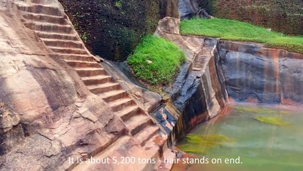 An ancient pool, entirely carved in rock on the top of Sigiriya