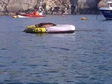 Seal sleeping on inflatable at St Justinians, St Davids, Pembrokeshire