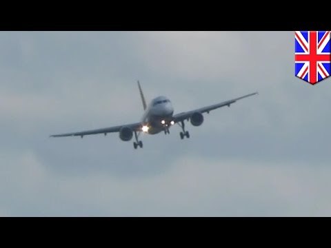 Dramatic Airplane Video: Airliner lands almost sideways during high winds - TomoNews