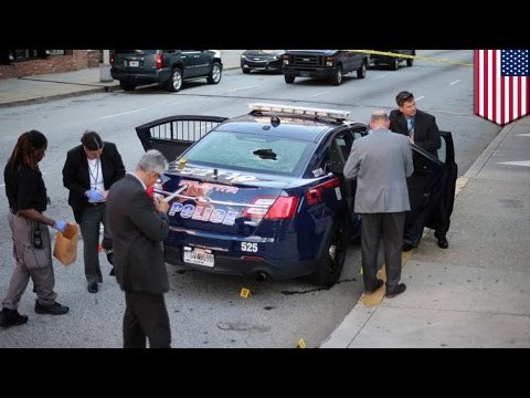 Atlanta shootout: woman shoots at cops while inside patrol car - TomoNews