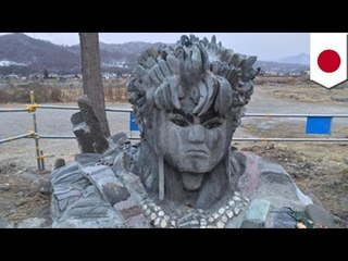 Strange Japan: Artist arrested for carving giant anime face on river stone in public area