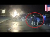 Hero police pull man from burning car crash seconds before it's engulfed in flames