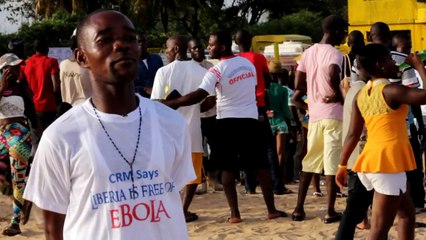 Liberians head to the beach to celebrate the end of Ebola