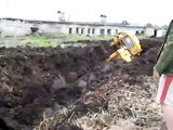 Tractors stuck in manure and mud