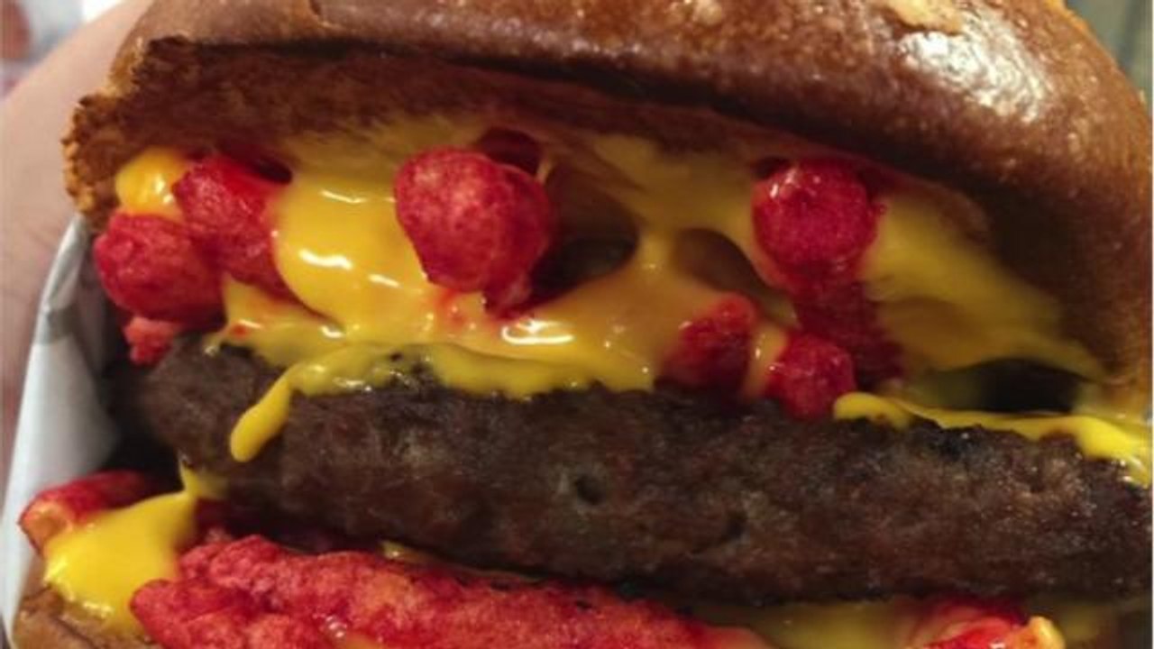 Carl's Jr. testing Cheeto topped burger