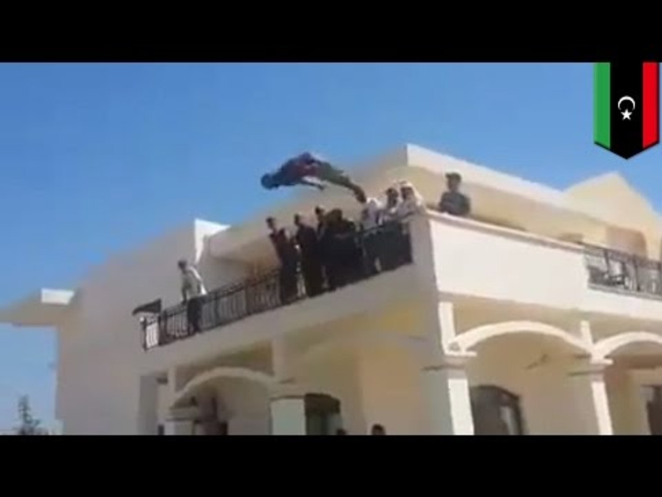 Dawn of Libya militants storm abandoned U.S. Embassy in Tripoli and have a swim