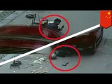 Run over by car: Chinese boy survives being getting run down by SUV (VIDEO)