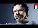 World’s most pierced man, Rolf Buchholz, stopped at airport customs in Dubai over black magic fears