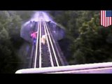 Train near death escape: Two women escape death by diving under freight train