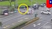 Amazing accident escape: Lucky scooter rider scores a hole-in-one: lands in a roadside inflatable po