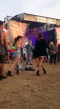 Girl vibin' at a music festival. Her dance moves are so mesmerizing