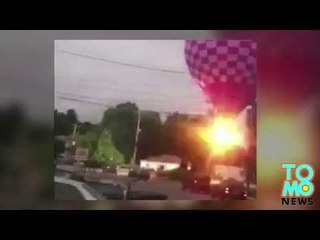 Balon zahacza o linie wysokiego napięcia.