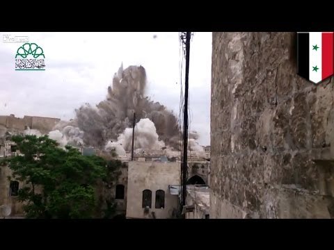 Syrian war: Huge bomb explosion destroys Aleppo hotel used by Assad's forces