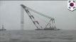 Massive floating cranes move into position of sunken South Korean ferry