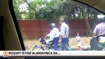 Polis memuru rüşvet vermeyen kadına taşla vurdu