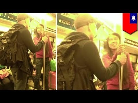 Foreign subway rider spits gum into hand of conductor, gives him the bird