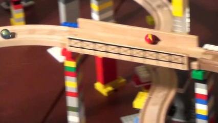 Race between two balls on a circuit